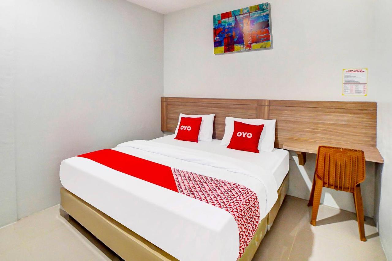 Oyo 91211 Mega Comfort Guest House Medan Esterno foto