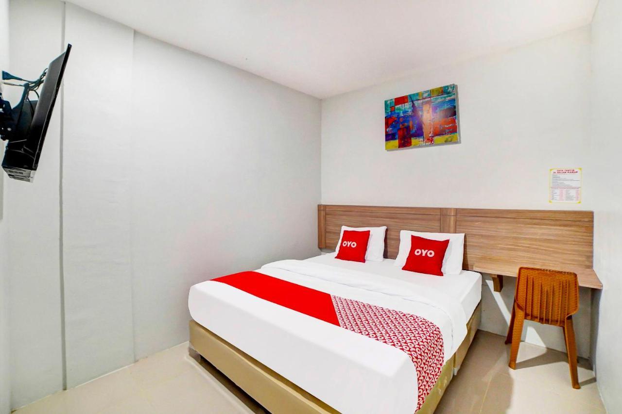 Oyo 91211 Mega Comfort Guest House Medan Esterno foto